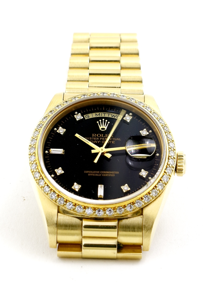 Auktionshaus Quentin Berlin  Schmuck Uhr  Armbanduhr  Rolex  Oyster Perpetual Day - Date 36  750er GG. mit Brillantlünette  1991
