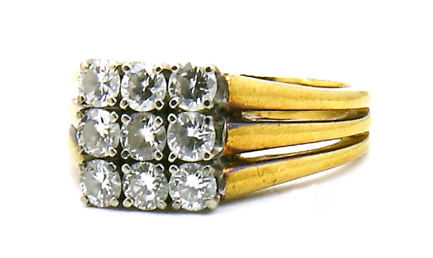 Auktionshaus Quentin Berlin  Schmuck Ring  750er GG. mit neun Diamanten im Brillantschliff  zus. 0 98 ct.
